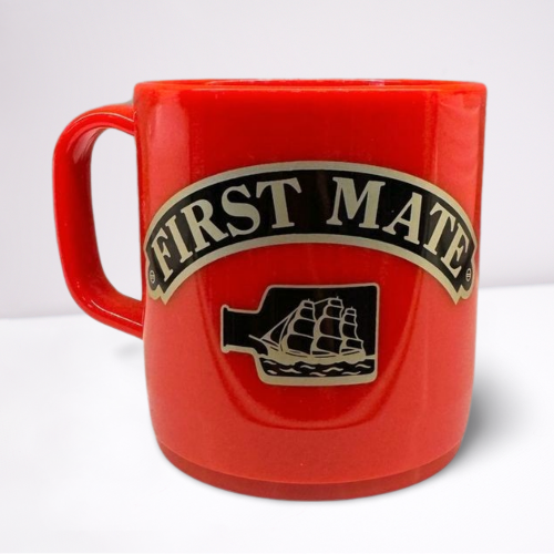 Red unbreakable mug, featuring black and gold accents of the words first mate and a ship in a bottle.