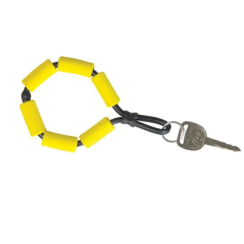 Yellow keychain with black cord and key attached on a white background