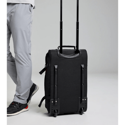 Compact and durable SLAM CABIN TROLLEY with front pocket and compression straps for organized packing.