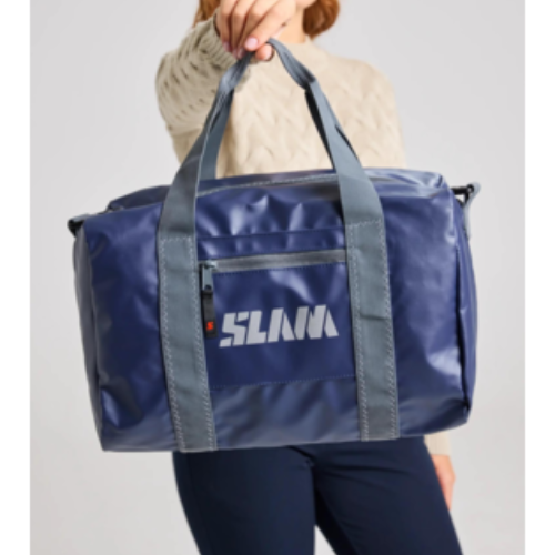Compact and durable SLAM DUFFEL BAG medium made from water-repellent PVC-coated nylon for everyday use.