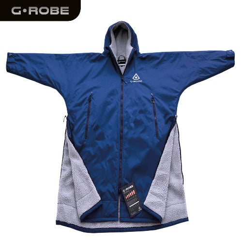 G.ROBE – ultimate recycled waterproof changing robe with rapid-dry fleece and dual side zips. Keeps you warm, dry, and comfortable for surfing or open-water swimming.