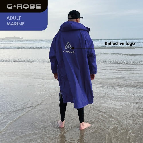 G.ROBE – versatile outdoor changing robe with 100% recycled waterproof outer layer and dual side zips. Keeps you warm, dry, and comfortable for surfing or open-water swimming.