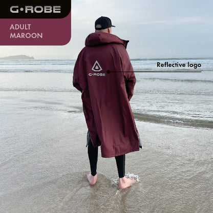 G.ROBE – ultimate recycled waterproof changing robe with rapid-dry fleece and dual side zips. Keeps you warm, dry, and comfortable for surfing or open-water swimming.