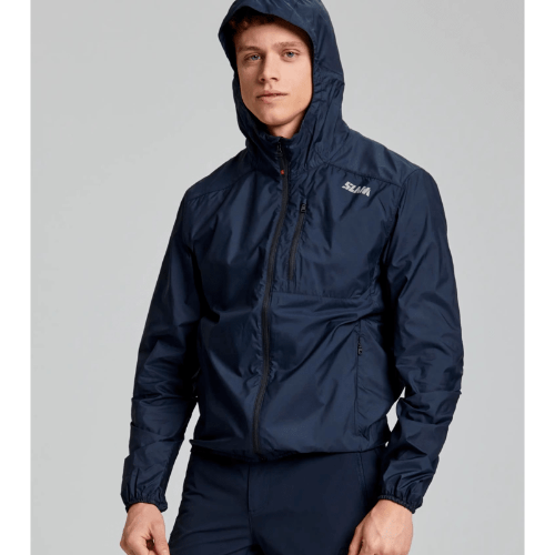 Lightweight SLAM ACT Packlite Jacket with windproof construction, reflective logo, and easy storage for travel.