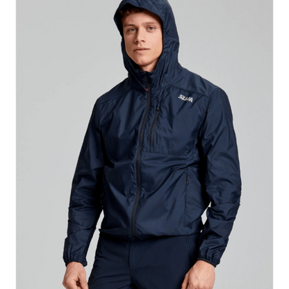 Lightweight SLAM ACT Packlite Jacket with windproof construction, reflective logo, and easy storage for travel.