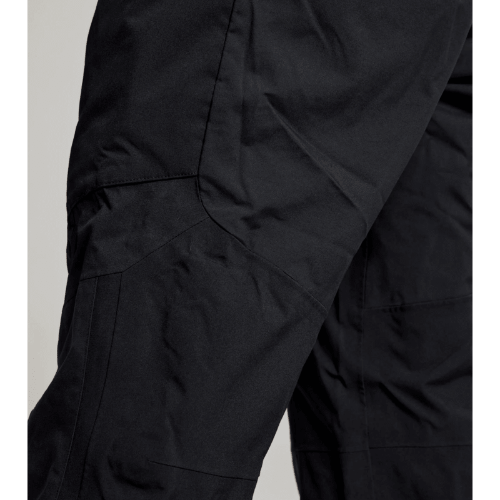 Marine performance bibs in black – SLAM Pro Coastal Bibs with reinforced high-wear areas, adjustable hem, and YKK zippers for long-lasting use.