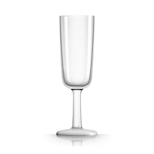 A clear glass with a white base, part of the Non Slip Drinkware collection designed by Marc Newson.