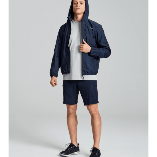 Reversible SLAM ACT Packlite Jacket with chest pocket that packs into itself for easy portability.