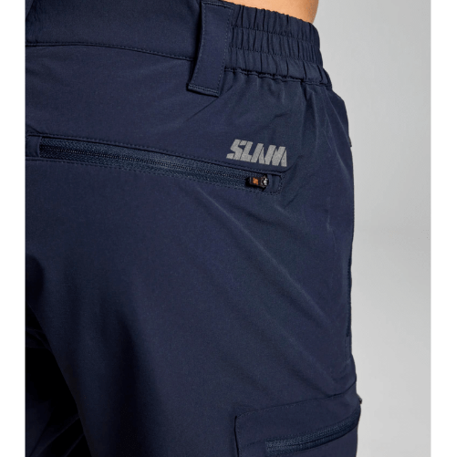 SLAM Tech Cargo Shorts – elastic nylon, quick-dry shorts with reinforced seat, gusseted pockets, and secure snap button closure for deck use.