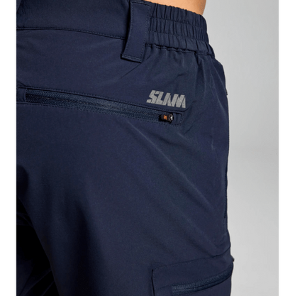 SLAM Tech Cargo Shorts – elastic nylon, quick-dry shorts with reinforced seat, gusseted pockets, and secure snap button closure for deck use.