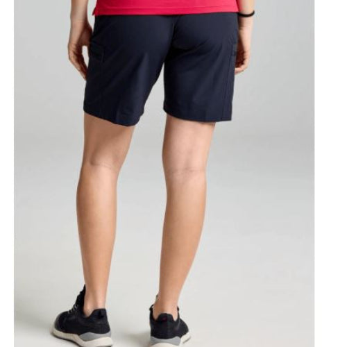 Person wearing navy shorts on a light gray background