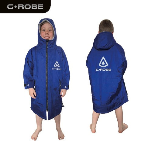 A child wearing a marine blue changing robe with a hood, featuring the G.ROBE brand logo on the back.