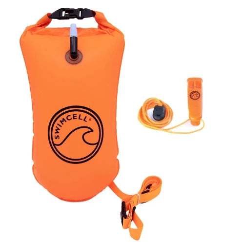 An orange Swimcell tow buoy with a logo that resembles a wave, an attached whistle, and an inflation valve, designed for open water swimming.